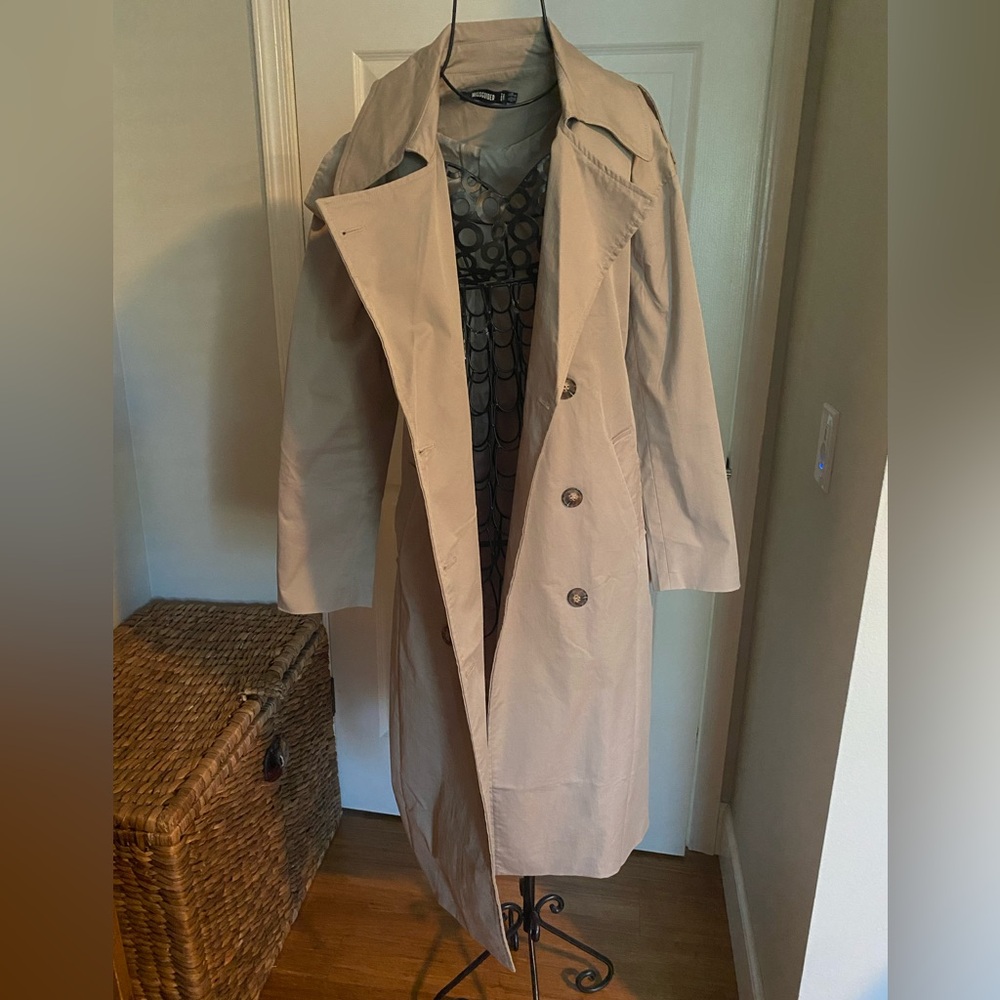 Beige trench coat with waist strap